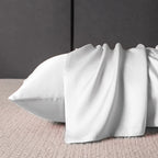 Tombé et brillance de la taie en soie, coloris Blanc nacré